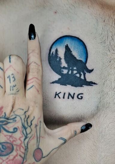 Blue Sky and Howling Wolf Chest Tattoo