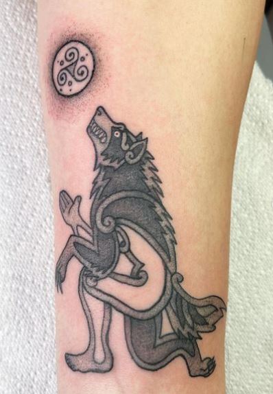 Black and Grey Werewolf Arm Tattoo