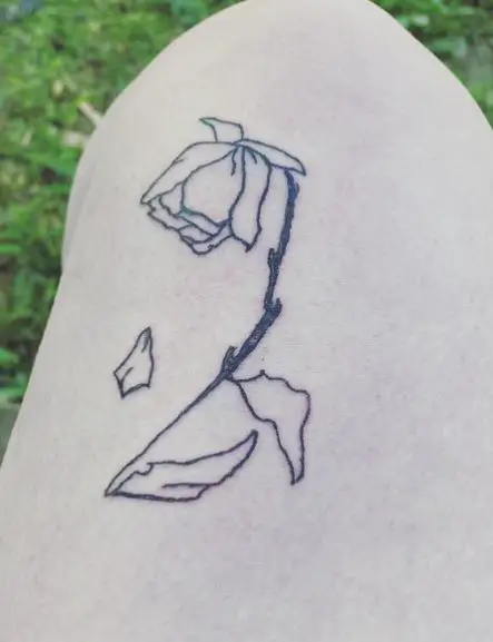 Fallen Petal and Dead Rose Thigh Tattoo