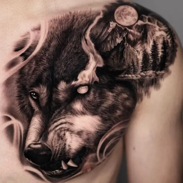 Night Landscape and Snarling Wolf Chest Tattoo