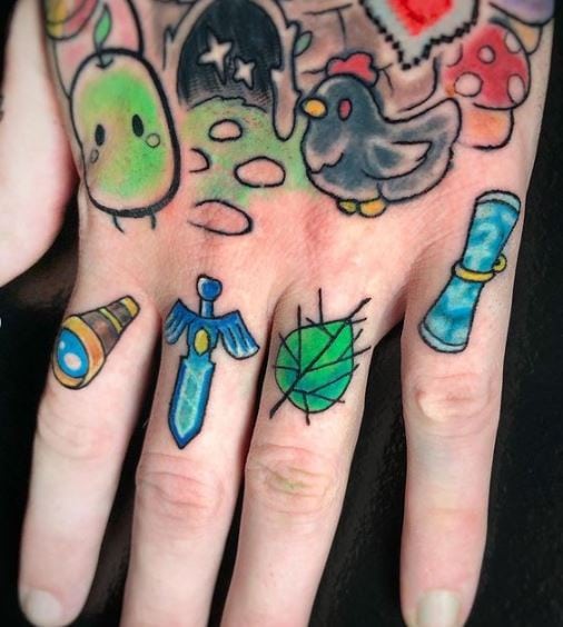Colorful Symbols Knuckles Tattoo