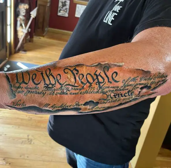 We The People with Part of The Constitution Forearm Tattoo