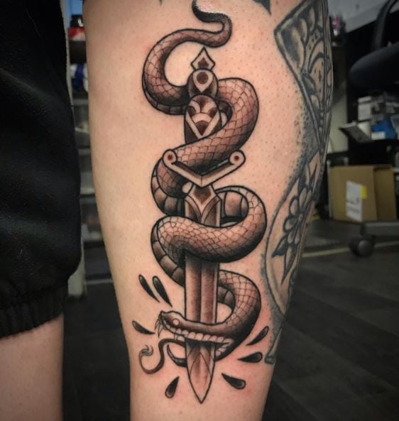 Black and Grey Stabbed Snake and Dagger Tattoo