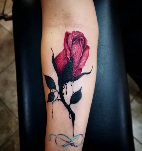 Eternity Symbol and Dying Rose Arm Tattoo