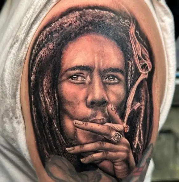 Realistic Bob Marley Smoking Joint Arm Tattoo