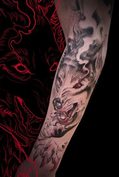 Snarling Wolf with Red Eyes Arm Tattoo