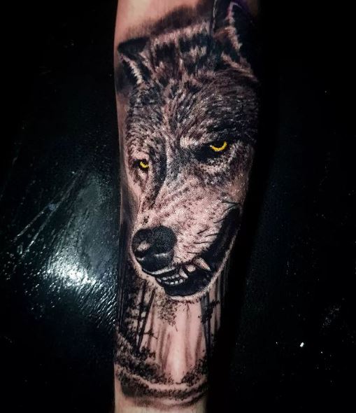 Angry Wolf with Yellow Eyes Forearm Tattoo
