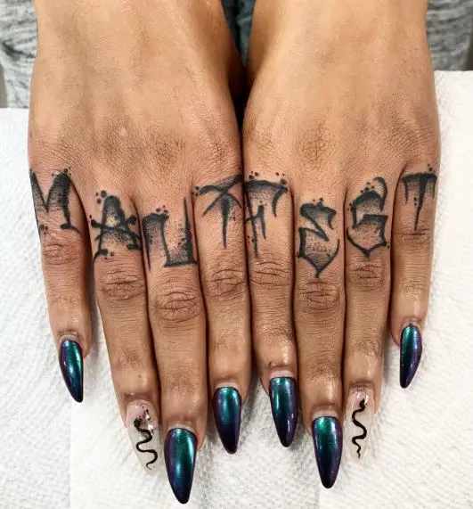 Creepy Font MANIFEST Knuckles Tattoo