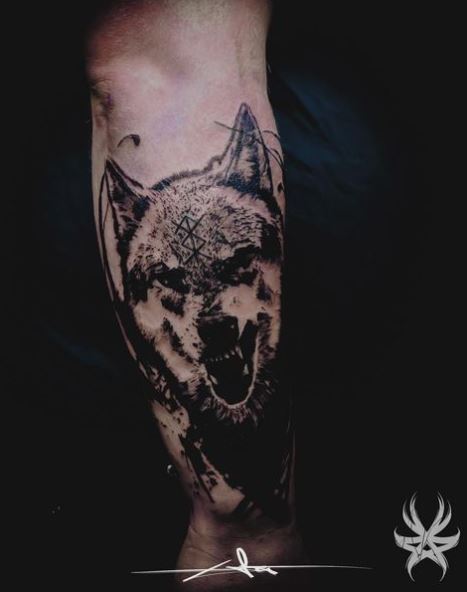 Black and Grey Snarling Wolf Forearm Tattoo