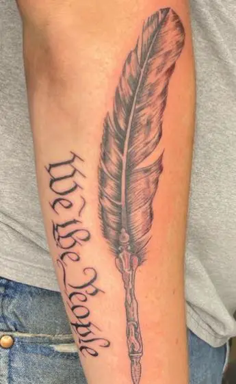 Writing Feather and We The People Forearm Tattoo
