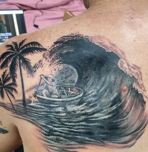 Man in Boat and Big Wave Back Tattoo