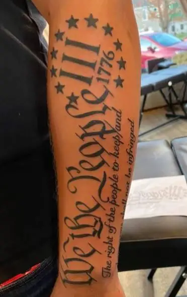 We The People with Part of The Constitution Forearm Tattoo