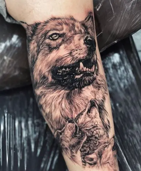 Howling Wolves Leg Tattoo