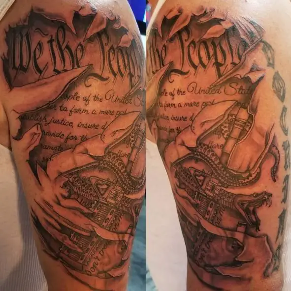 Snake and We The People Arm Tattoo