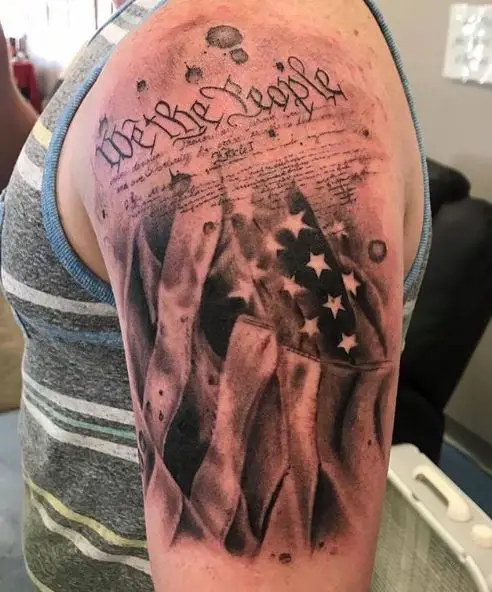 We The People with Part of The Constitution Arm Tattoo
