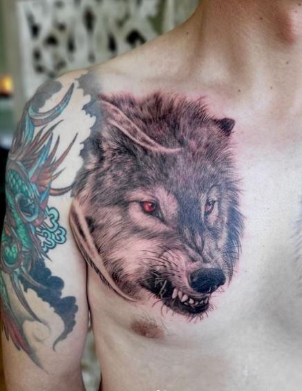 Snarling Wolf with Red Eyes Chest Tattoo