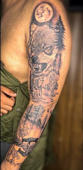 Mountain Landscape and Angry Wolf Arm Tattoo