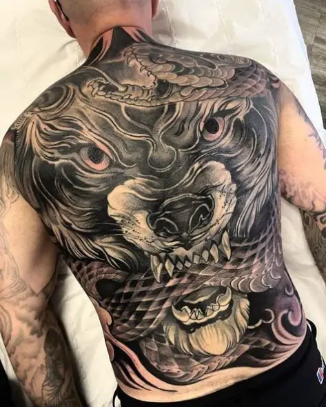 Snake and Snarling Wolf Full Back Tattoo