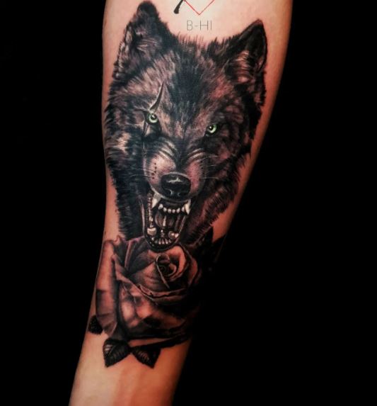 Red Rose and Dark Angry Wolf Forearm Tattoo