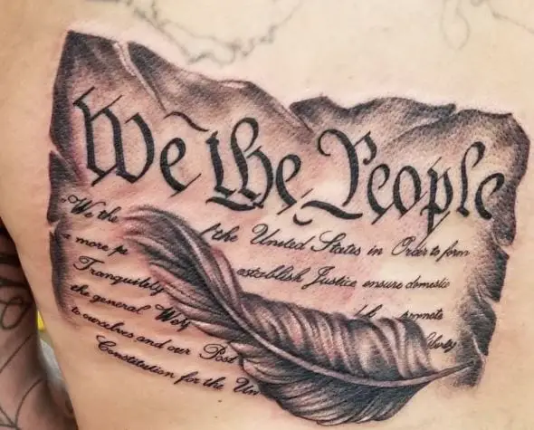 Feather and We The People Back Tattoo