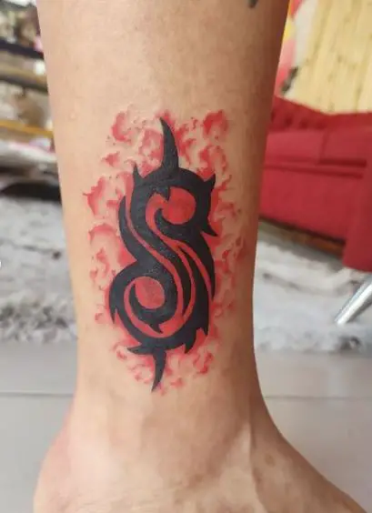 Red and Black Symbol Ankle Tattoo