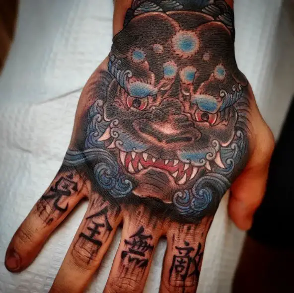 Colorful Foo Dog and Japanese Letters Hand to Knuckles Tattoo