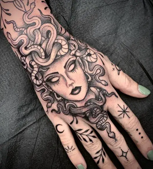 Medusa with Stars and Leaves Hand to Knuckles Tattoo