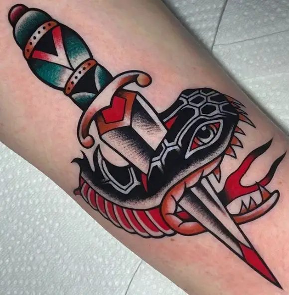 Pierced Snake Head with Dagger Tattoo