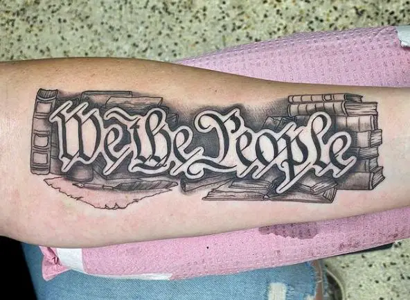 Books and We The People Forearm Tattoo