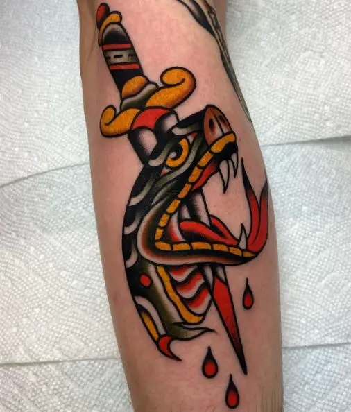 Dagger Pieced in Snake and Drops of Blood Arm Tattoo