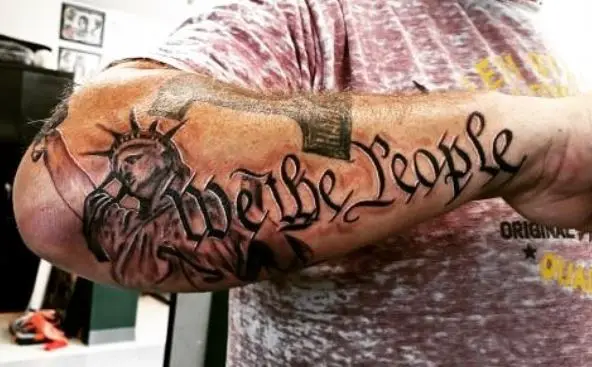 Statue of Liberty and We The People Forearm Tattoo