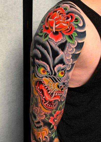 Red Rose and Traditional Wolf Arm Sleeve Tattoo