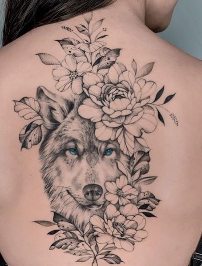 Flowers and Wolf with Blue Eyes Back Tattoo