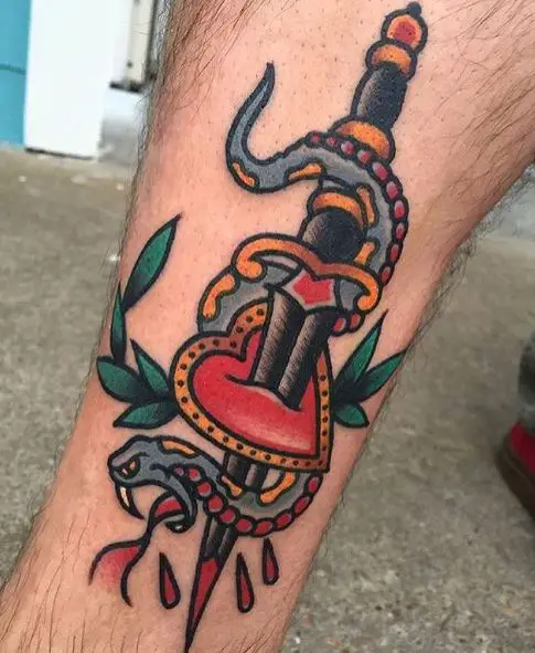Dagger Stabbed in Snake and Heart Leg Tattoo