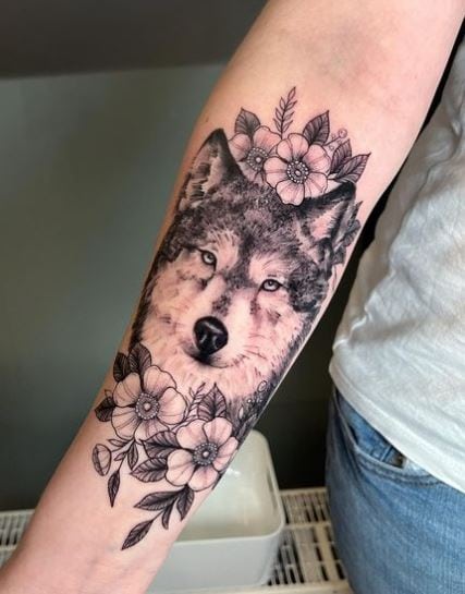 Realistic Flowers and Wolf Forearm Tattoo