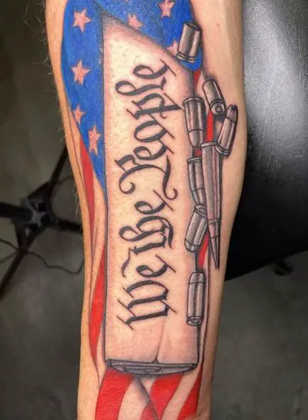 Bullets and We The People Arm Tattoo