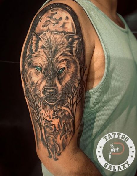 Forest and Wolves Arm Tattoo