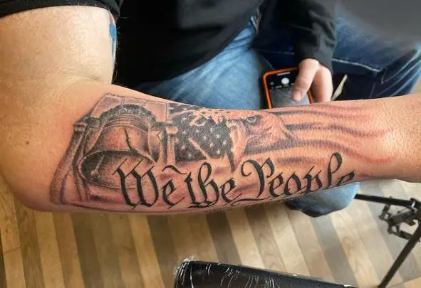 Liberty Bell and We The People Forearm Tattoo
