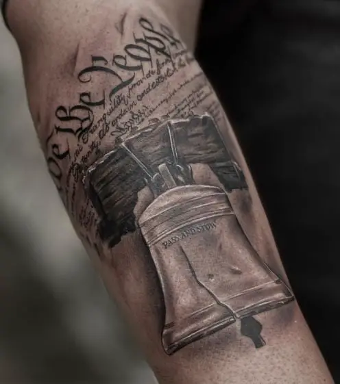 Liberty Bell and We The People Forearm Tattoo