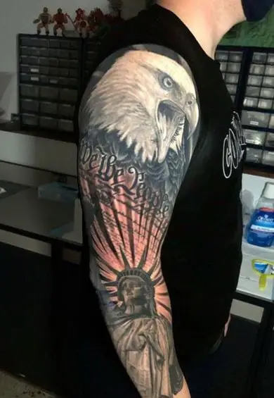 We The People with Eagle and Statue of Liberty Arm Tattoo