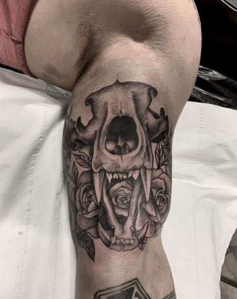 Roses and Wolf Skull Biceps Tattoo