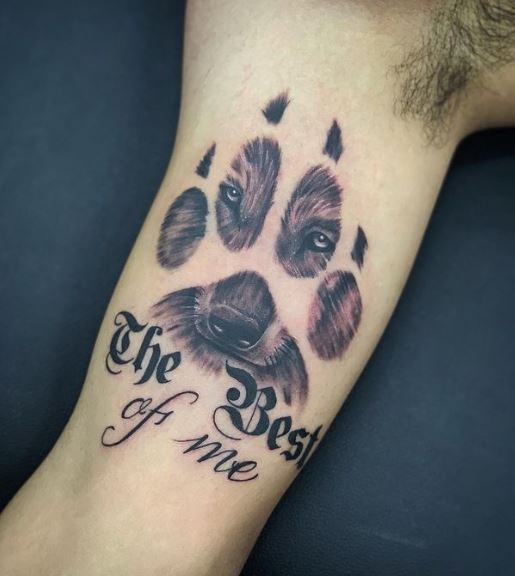 Black and Grey Wolf Paw Biceps Tattoo
