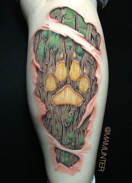 Wolf Paw in Wood Leg Tattoo