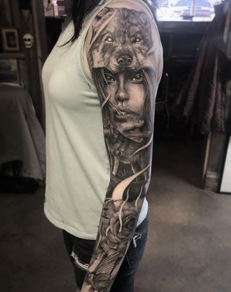 Girl with Roses and Wolf Headdress Arm Tattoo