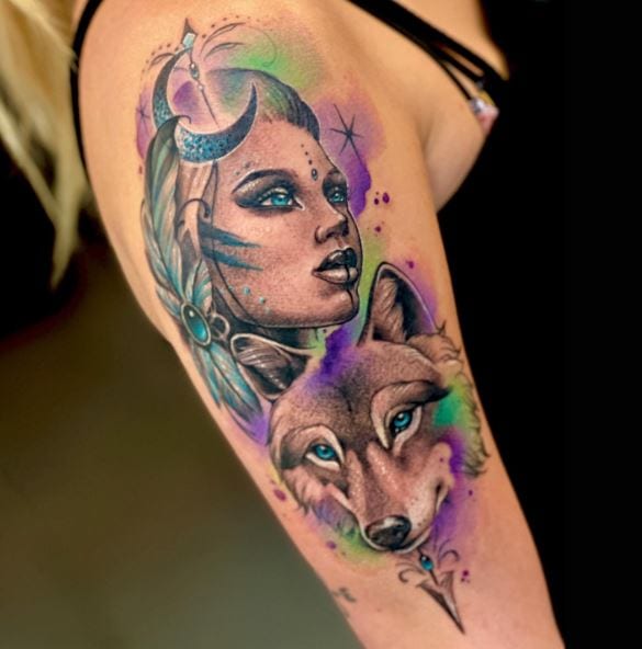 Girl with Moon and Wolf Arm Tattoo