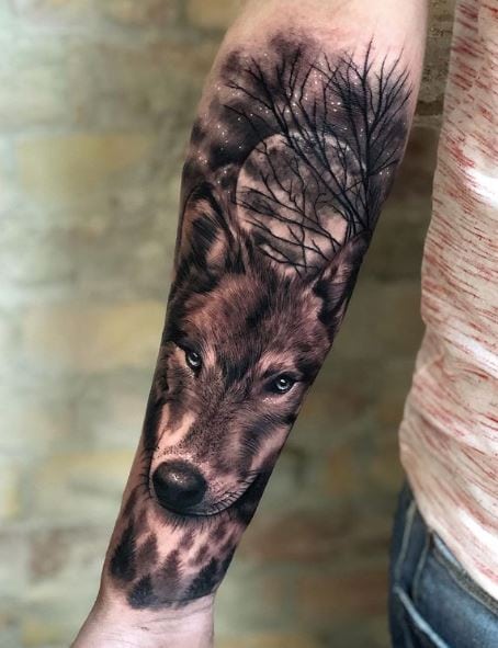 Dark Forest and Wolf Forearm Tattoo