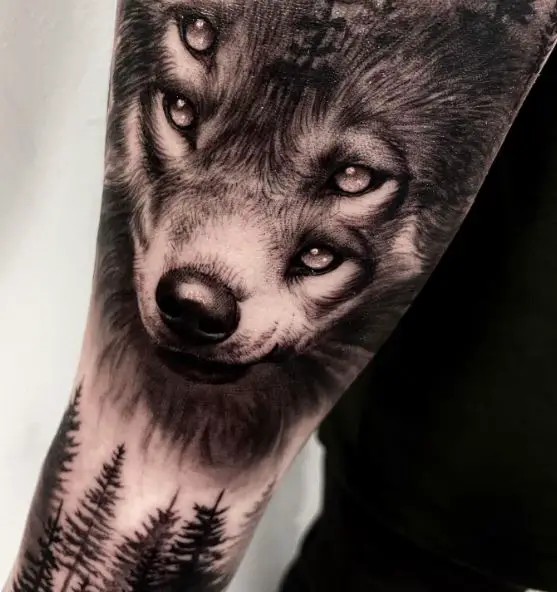 Forest and Wolf with Four Eyes Arm Tattoo
