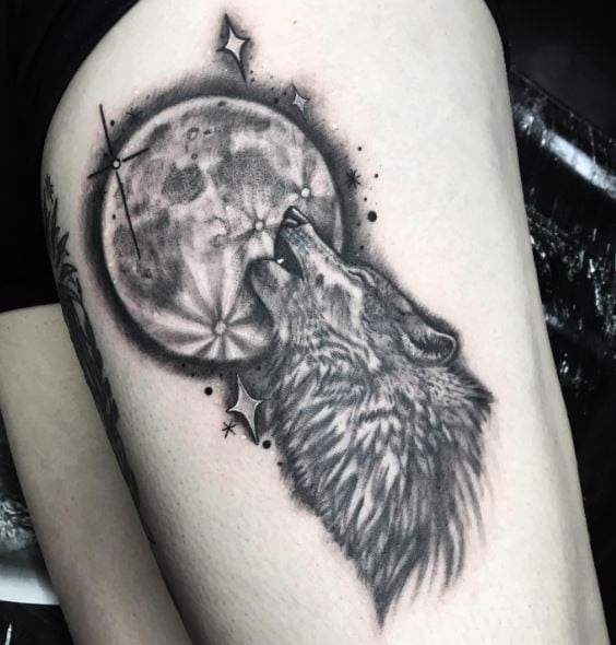 Moon and Howling Wolf Thigh Tattoo