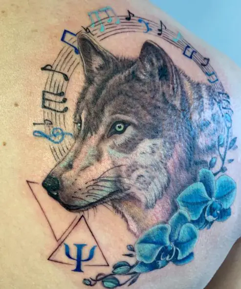 Blue Flowers and Realistic Wolf Back Tattoo