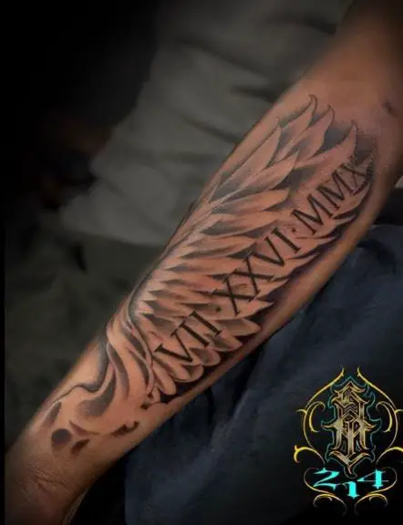Angel Wings with Some Roman Numerals Tattoo